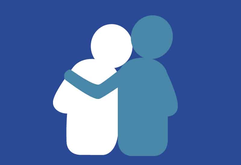 Person_der_holder_en_anden_person_om_skulderen
